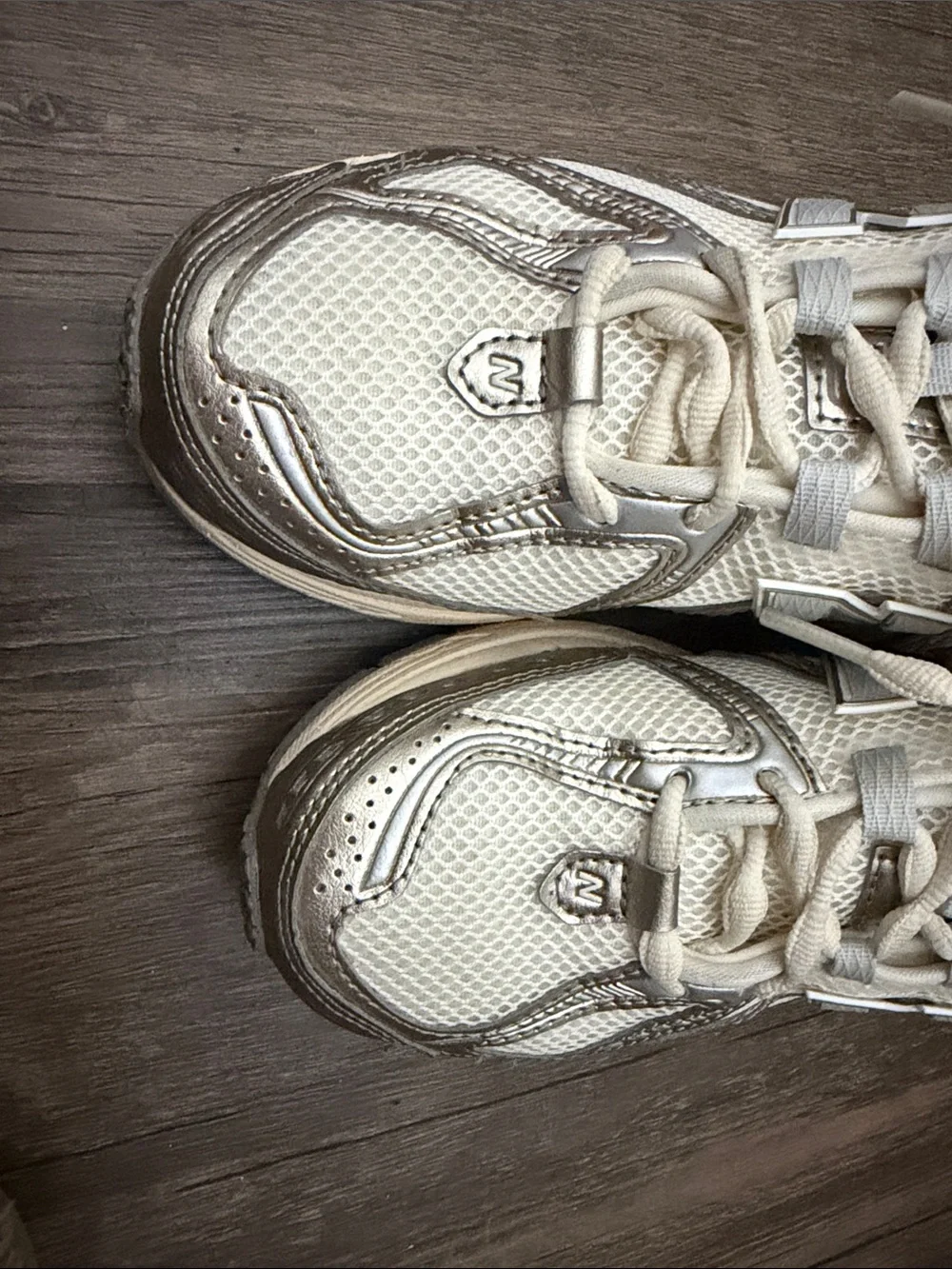 New Balance Women’s Cream and Metallic Silver Athletic Sneakers 1906
